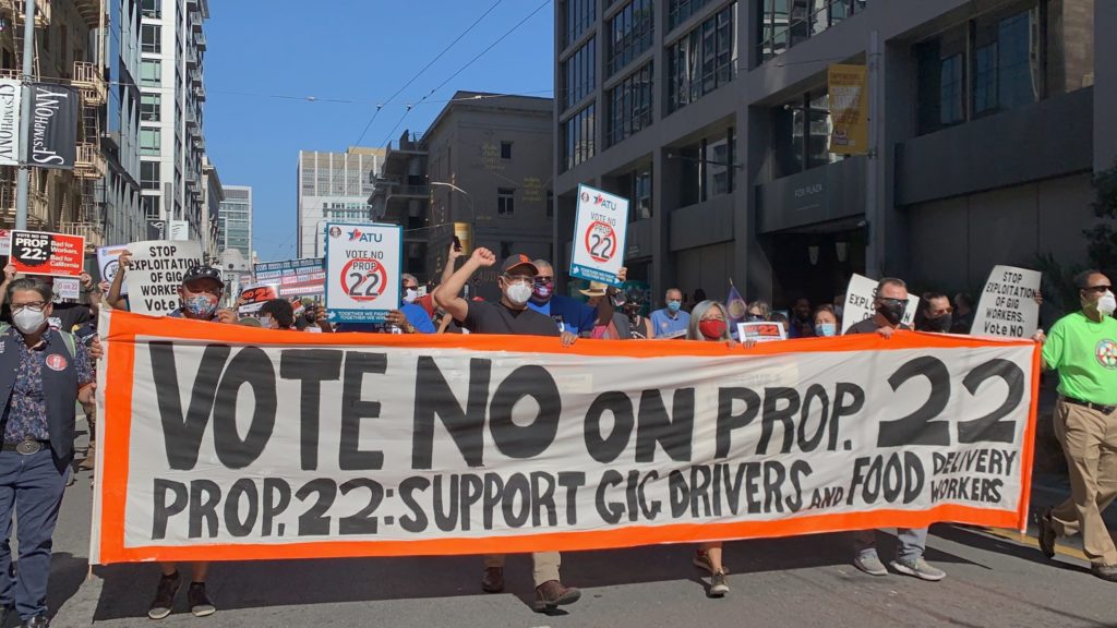 Advocates for Vote No on Prop 22 at a protest