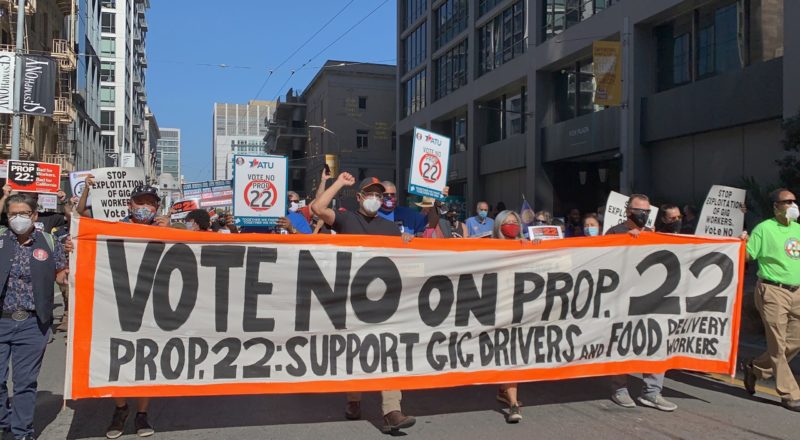 Advocates for Vote No on Prop 22 at a protest