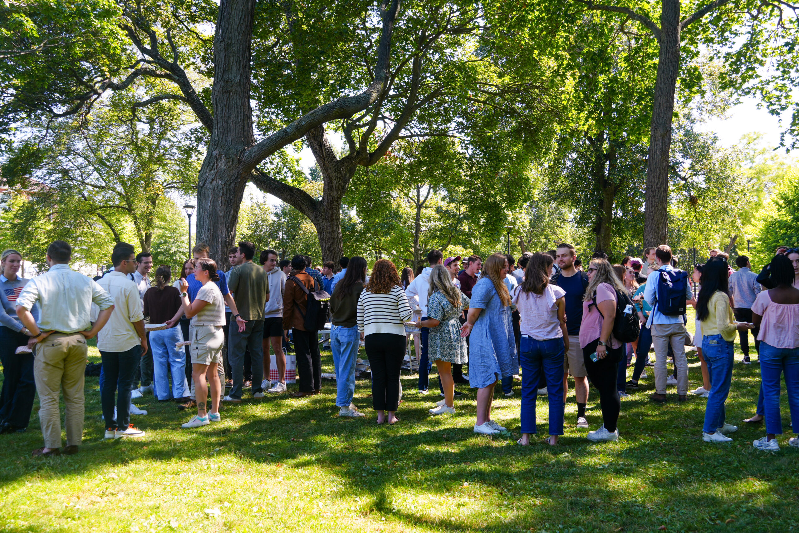 Harvard Federalist Society members gathered outdoors at Harvard Law School