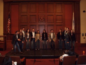 People performing inside Ames courtroom. 